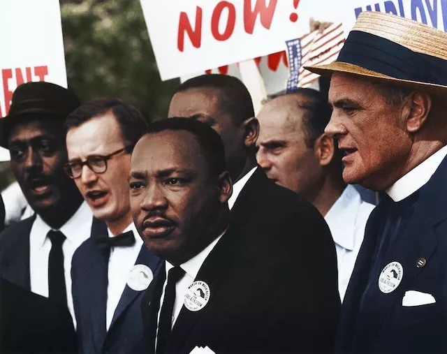 Dr. Martin Luther King, Jr. and Mathew Ahmann in a crowd of demonstrators at the March on Washington - American Holidays (Birthday of Martin Luther King)